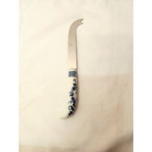 Vintage Lord & Taylor flatware piece ceramic handled cheese knife. Blue and whit